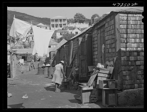Untitled photo, possibly related to: Charlotte Amalie, Saint Thomas Island, Virgin Islands. Washing clothes in a slum section