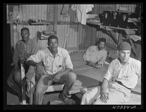 Charlotte Amalie, Saint Thomas Island, Virgin Islands. Defense workers employed at the Naval base resting in their living quarters