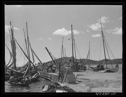 Charlotte Amalie, Saint Thomas Island, Virgin Islands. Fish and supply boats are tied up at Tortolla wharf