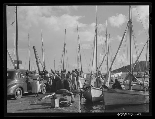 Charlotte Amalie, Saint Thomas Island, Virgin Islands. Fish and supply boats are tied up at Tortolla wharf