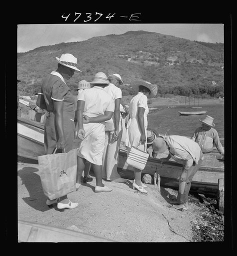 Untitled photo, possibly related to: French village, a small settlement on Saint Thomas Island, Virgin Islands. Women come down to the French village, a small settlement, to buy fish from the incoming boats