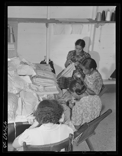 Untitled photo, possibly related to: Santurce, Puerto Rico. Women working at the Rodriguez needlework factory