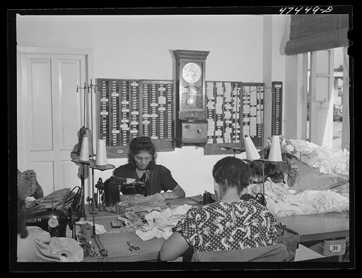Santurce, Puerto Rico. Women working at the Rodriguez needlework factory. Minimum wage is six dollars a week