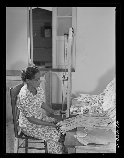 Santurce, Puerto Rico. Women working at the Rodriguez needlework factory