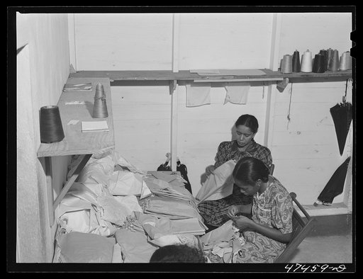 Untitled photo, possibly related to: Santurce, Puerto Rico. Women working at the Rodriguez needlework factory. Minimum wage is six dollars a week
