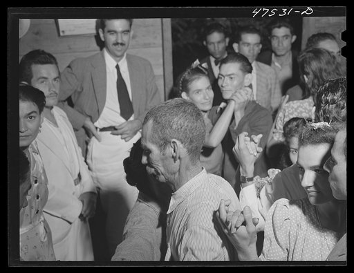 Untitled photo, possibly related to: Guanica, Puerto Rico (vicinity). At a Three Kings' eve party in a tenant farmer's home in the sugar country