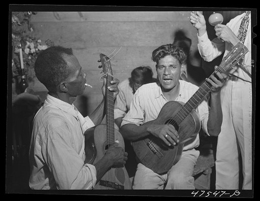 Untitled photo, possibly related to: Guanica, Puerto Rico (vicinity). At a Three Kings' eve party in a tenant farmer's home in the sugar country