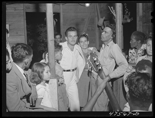Untitled photo, possibly related to: Guanica, Puerto Rico (vicinity). At a Three Kings' eve party in a tenant farmer's home in the sugar country