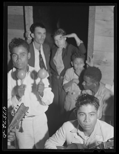 Untitled photo, possibly related to: Guanica, Puerto Rico (vicinity). At a Three Kings' eve party in a tenant farmer's home in the sugar country