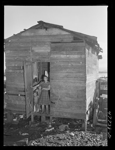 Untitled photo, possibly related to: San Juan, Puerto Rico. In the huge slum area known as "El Fangitto" ("the mud")
