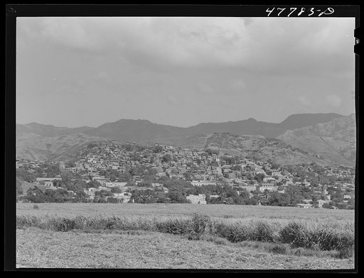 Yauco, Puerto Rico. The town, with slums sprawled on the hillside