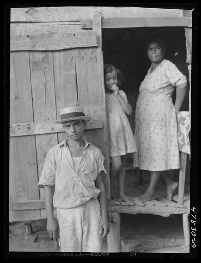 Untitled photo, possibly related to: Yauco, Puerto Rico (vicinity). Family of a FSA (Farm Security Administration) borrower in their home