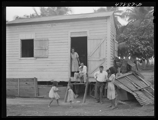 Untitled photo, possibly related to: Guayanilla, Puerto Rico. Houses in a company village behind a sugar mill