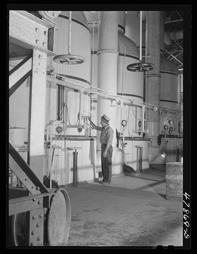 Ensenada, Puerto Rico. Vats for boiling and crystalizing the syrup in the South Puerto Rico Sugar Company