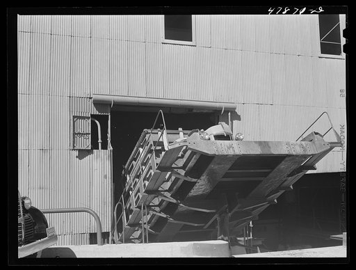 Untitled photo, possibly related to: Ensenada, Puerto Rico. Apparatus for tilting the truck in order to slide the sugar cane down into the grinding mills at the South Puerto Rico Sugar Company