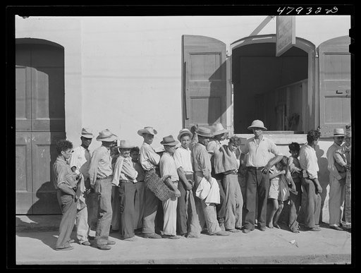 Cabo Rojo, Puerto Rico. Waiting in line at the surplus commodities office. Fatback and meal were distributed that day