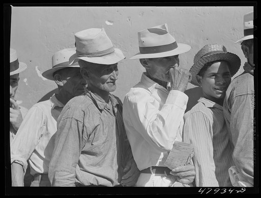 Untitled photo, possibly related to: Cabo Rojo, Puerto Rico. Waiting in line at the surplus commodities office. Fatback and meal were distributed that day