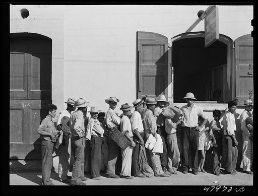 Untitled photo, possibly related to: Cabo Rojo, Puerto Rico. Waiting in line at the surplus commodities office. Fatback and meal were distributed that day