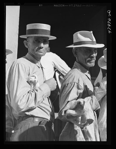 Untitled photo, possibly related to: Cabo Rojo (vicinity), Puerto Rico. Waiting in line for surplus commodities. They received fatback and meal