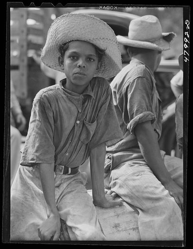 San Sebastian, Puerto Rico (vicinity). Farmer's son on a road