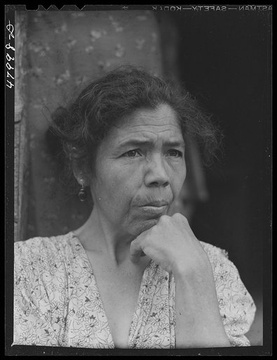 Untitled photo, possibly related to: Utuado, Puerto Rico (vicinity). Farm laborer's wife who was being interviewed for eligibility in FSA (Farm Security Administration)'s farm labor program