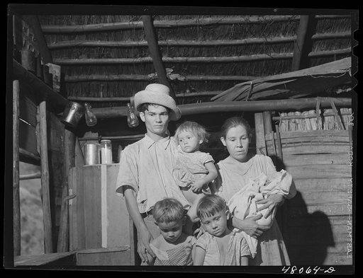 Utuado, Puerto Rico (vicinity). FSA (Farm Security Administration) borrower and his family living in the hills