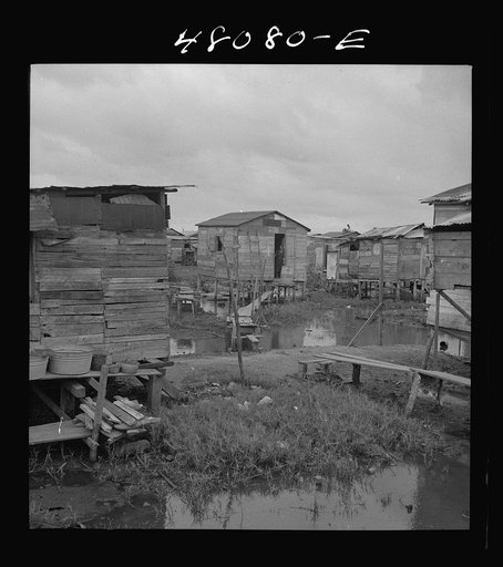 Untitled photo, possibly related to: San Juan, Puerto Rico. In the huge slum area known as "El Fangitto"