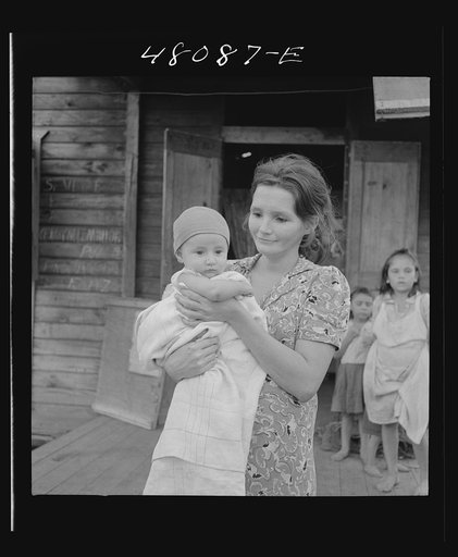 San Juan, Puerto Rico. Mother and child in the slum area known as "El Fangitto"