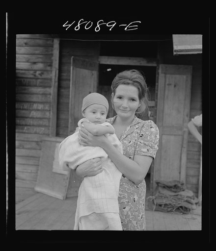 Untitled photo, possibly related to: San Juan, Puerto Rico. Mother and child in the slum area known as "El Fangitto"