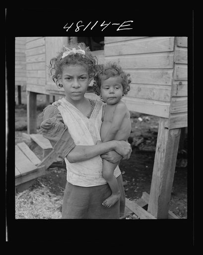 Untitled photo, possibly related to: San Juan, Puerto Rico. In the huge slum area known as "El Fangitto"