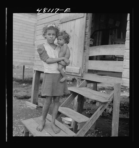 Untitled photo, possibly related to: San Juan, Puerto Rico. In the huge slum area known as "El Fangitto"