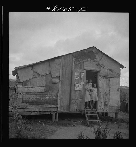 Santurce, Puerto Rico (vicinity). A house on the property which FSA (Farm Security Administration) is buying for a land and utility housing project