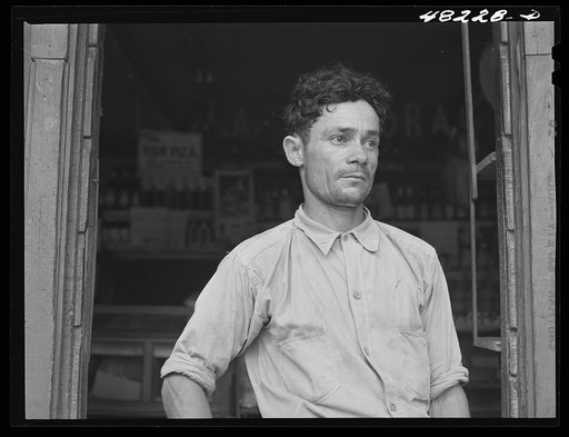 Manati (vicinity), Puerto Rico. Storekeeper on a road near Manati