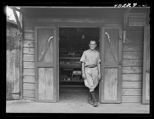 Manati (vicinity), Puerto Rico. Storekeeper on a road