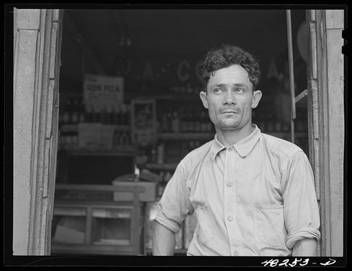 Manati (vicinity), Puerto Rico. Proprietor of a little store on a road