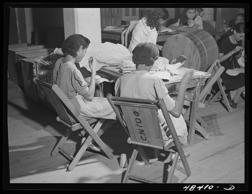 Untitled photo, possibly related to: San Juan (vicinity), Puerto Rico. In a needlework factory