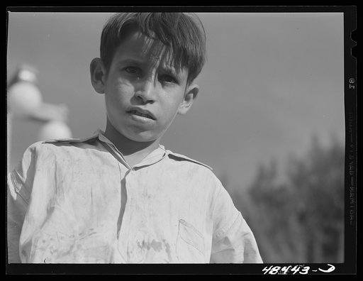 Untitled photo, possibly related to: San Sebastian, Puerto Rico. Boy who was playing in the street