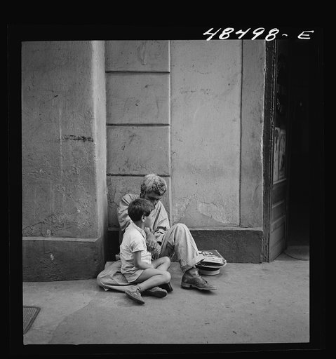 Untitled photo, possibly related to: San Juan, Puerto Rico. Beggar and child on a street