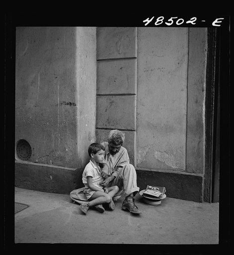 Untitled photo, possibly related to: San Juan, Puerto Rico. Beggar and child on a street