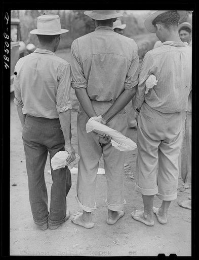 Yabucoa, Puerto Rico (vicinity). Sugar cane workers on strike. The loaf of bread each one is holding is their lunch