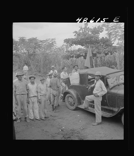Untitled photo, possibly related: Yabucoa, Puerto Rico. Car bringing lunch to pickets against the management of a sugar plantation