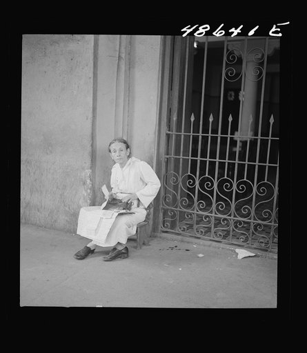 Untitled photo, possibly related to: San Juan, Puerto Rico. Selling lottery tickets on the street