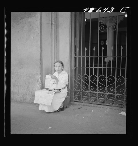 Untitled photo, possibly related to: San Juan, Puerto Rico. Selling lottery tickets on the street