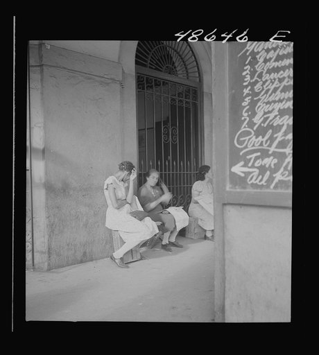 Untitled photo, possibly related to: San Juan, Puerto Rico. Selling lottery tickets on the street