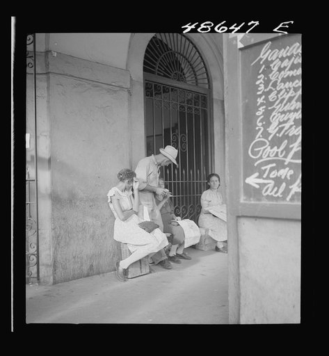 Untitled photo, possibly related to: San Juan, Puerto Rico. Selling lottery tickets on the street