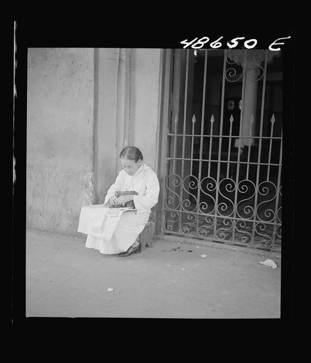 Untitled photo, possibly related to: San Juan, Puerto Rico. Selling lottery tickets on the street