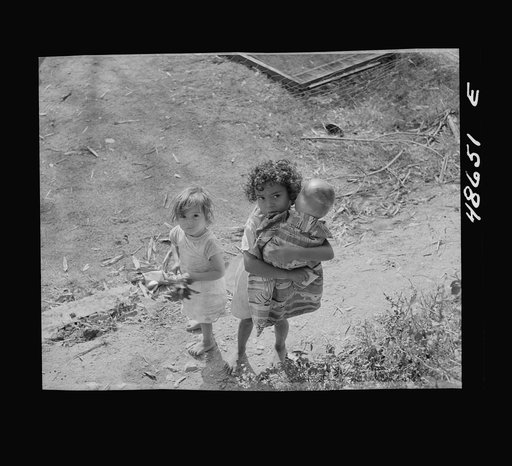 Bayamon, Puerto Rico. Children in a backyard