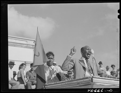 Untitled photo, possibly related to: Yabucoa, Puerto Rico. Union leader speaking to strikers at a meeting in the plaza