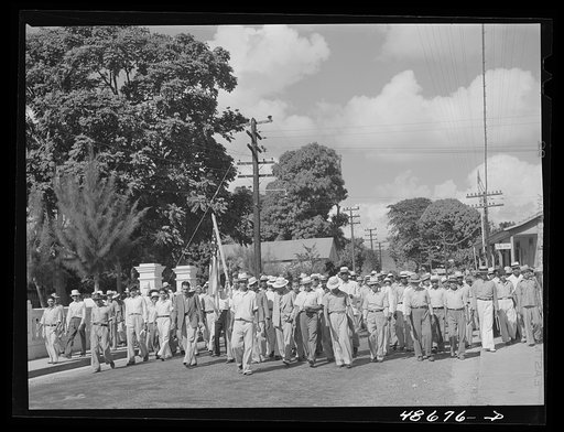 Yabucoa, Puerto Rico (vicinity). Procession of sugar strikers through a small town