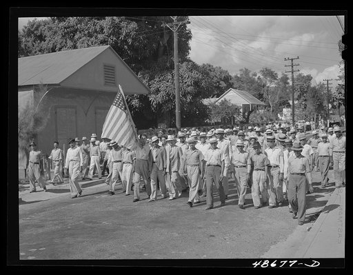 Yabucoa, Puerto Rico (vicinity). Procession of sugar strikers through a small town